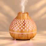 Dyfuzor Aroma Orient z różową poświatą i parą nad otworem
