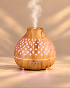 Dyfuzor Aroma Orient z różową poświatą i parą nad otworem
